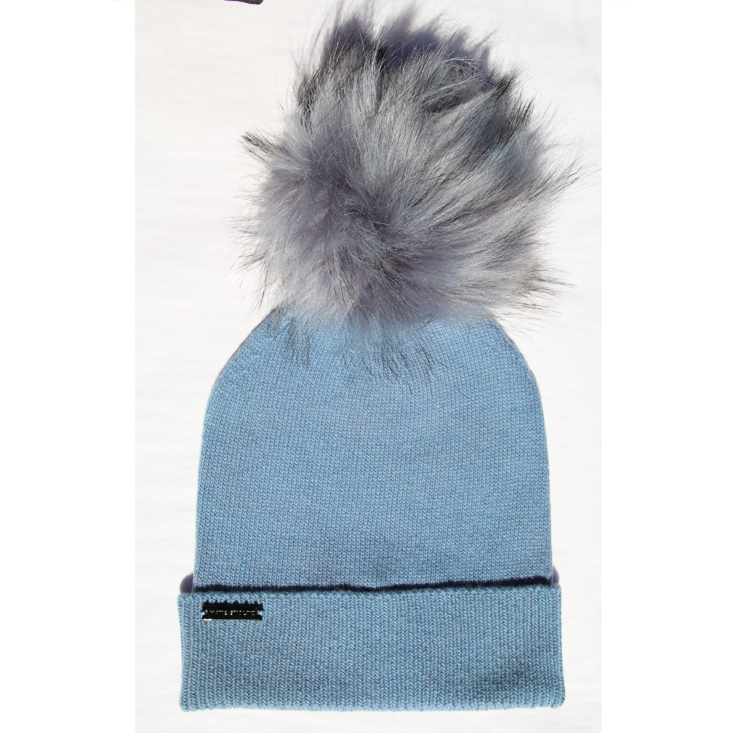 Blue beanie with a gray fur pom-pom 