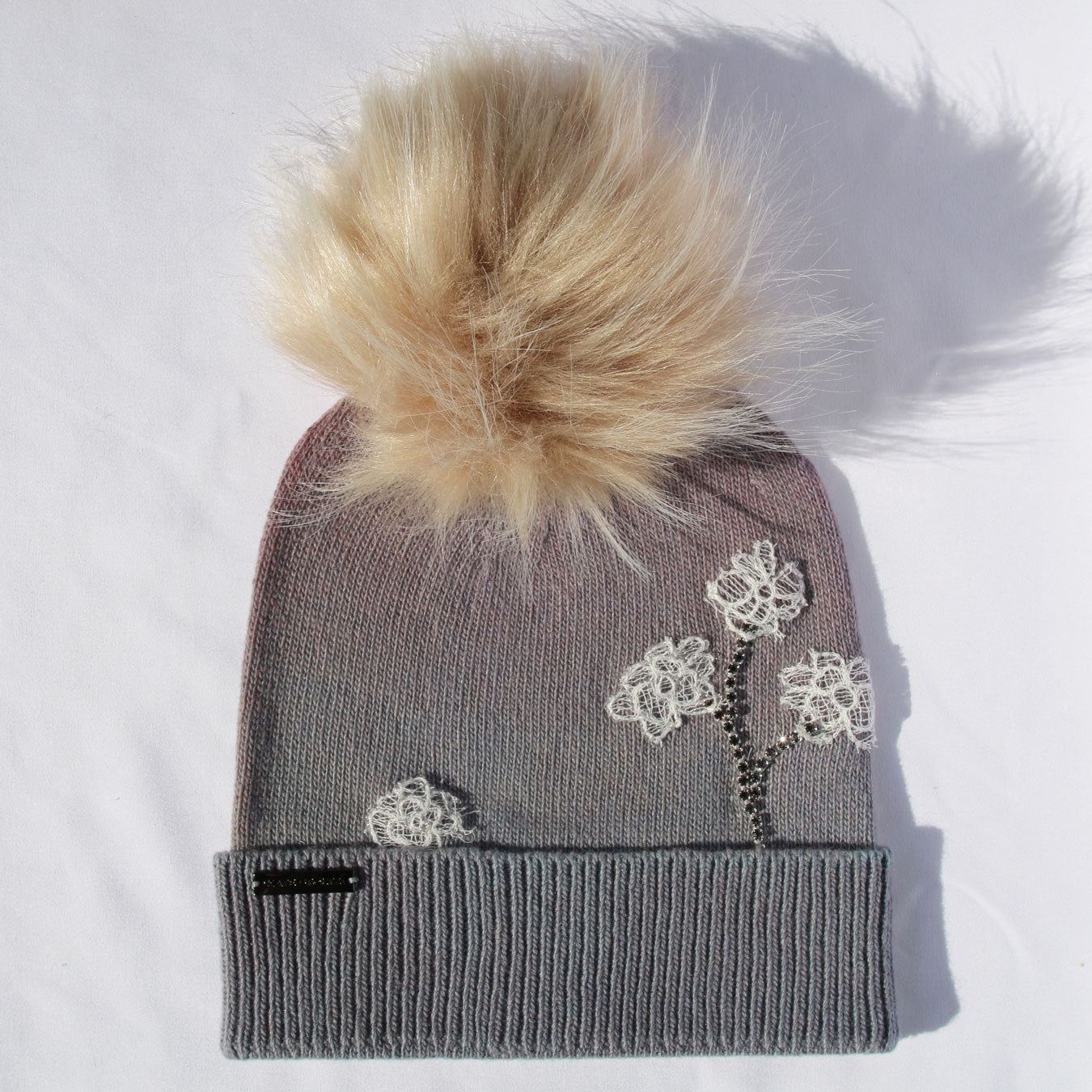 lavender-cashmere-knit-hat-with-tan-fur-pom-pom