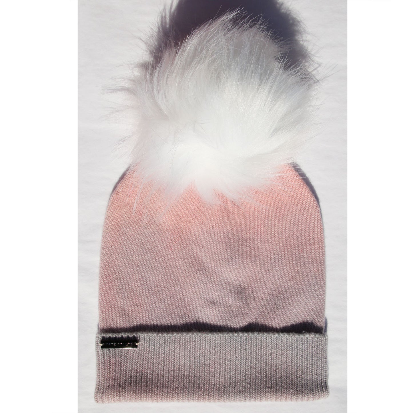Knitted beanie with gradient lavender pink color and white fur pom-pom 