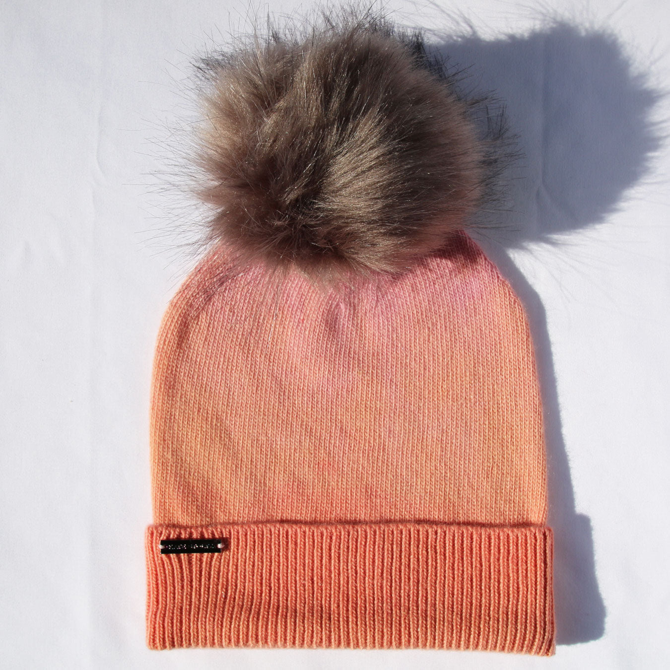 pink-orange-sunset-knit-hat with brown faux fur   pom pom