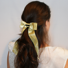 large gold metallic hair bow clip for special occasions 